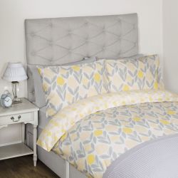 conjunto de ropa de cama con flores amarillas y grises de diseño