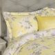 funda nórdica estampada con flores en amarillo y gris de diseño para camas de revista