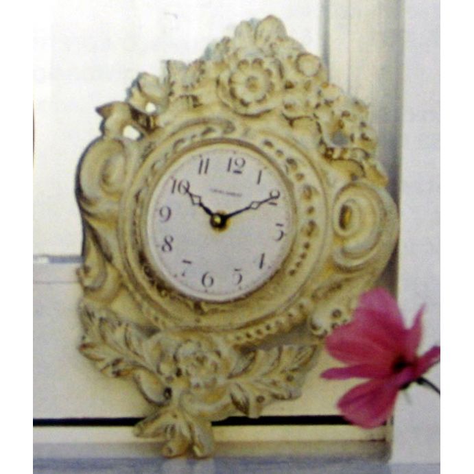 reloj de pared con decoración floral