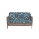 sofá para jardín en ratán color roble con cojines estampados de diseño