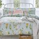 set de cama con pájaros y flores en azul verdoso