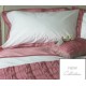 ropa de cama rosa y blanco