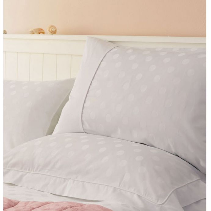 funda nórdica blanca para cama con diseño de topos jarquard
